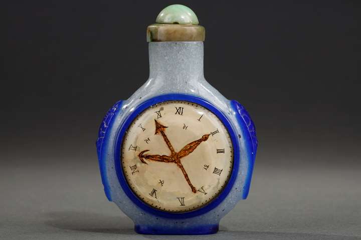 Blue overlay glass snuff bottle with a rare representation of a watch on each side in eglomized glass